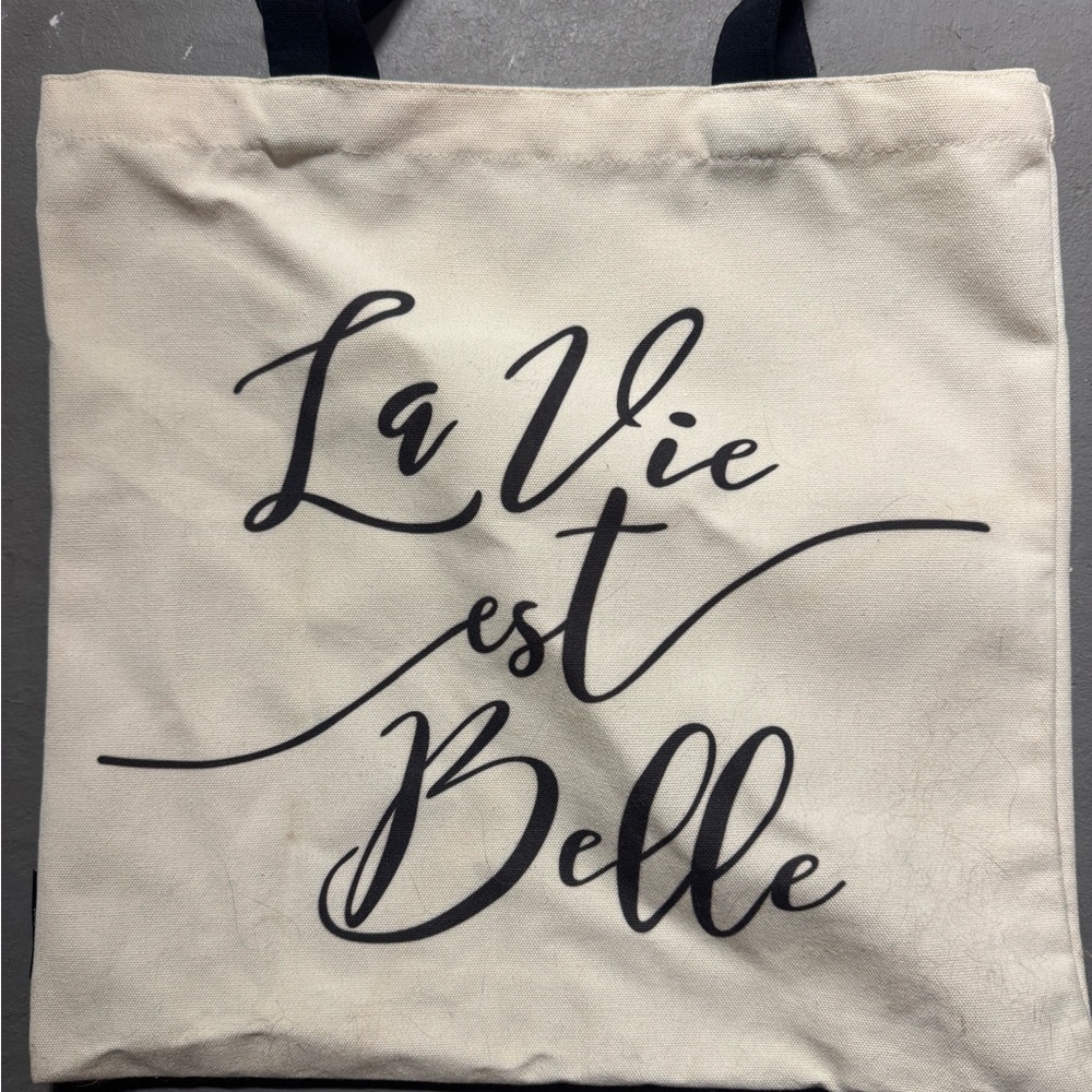 Elegant Cream Tote Bag with Script Design